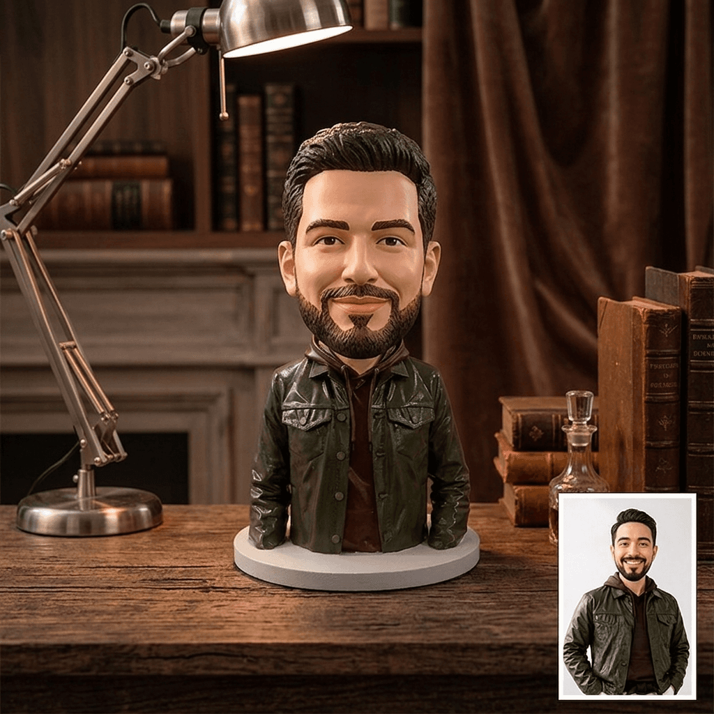 A half-body 3D printed miniature of a bearded man in a green jacket, beside the photograph it was sculpted from